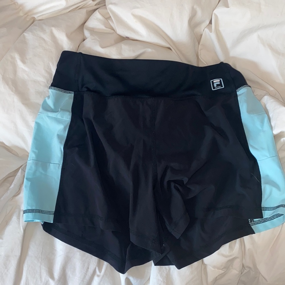 Fila Sport black and aqua athletic shorts.
Lined to bottoms Size medium